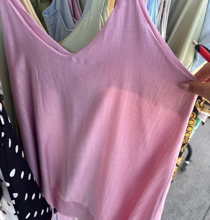 Pink clothes on hangers
